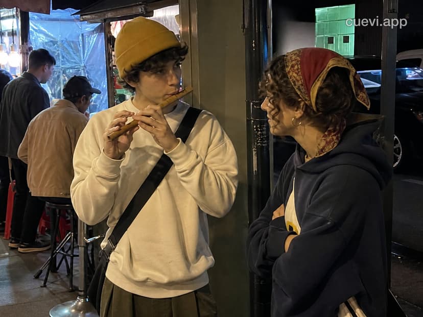 The Young Flute Player from the Masterpiece, Caught on Camera After Work